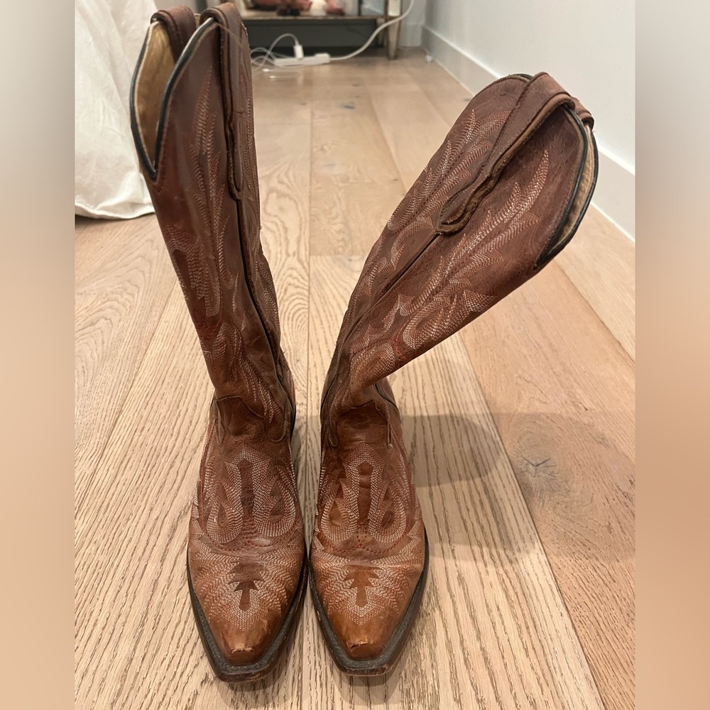 Brown leather cowboy boots